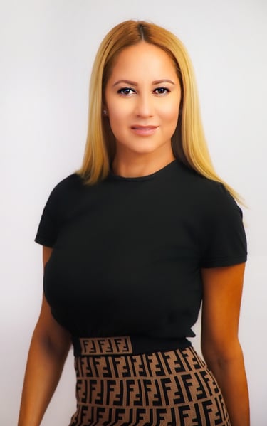 a real estate agent- woman in a black top and a brown fendi skirt