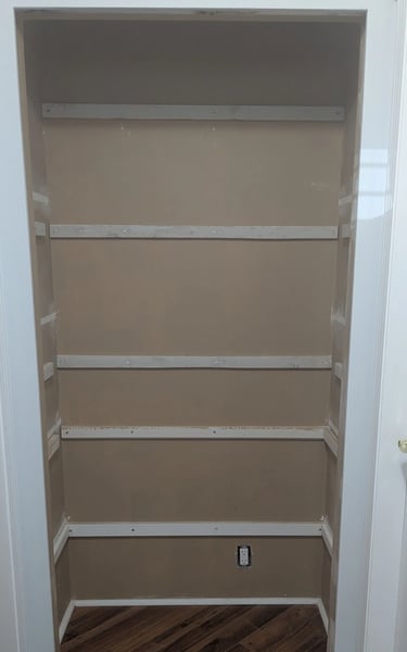 New shelf cleats in kitchenware closet