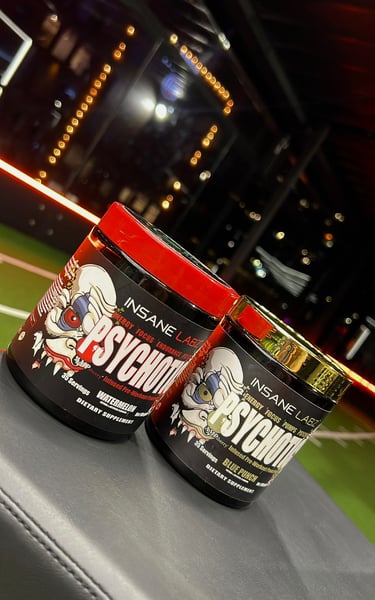 Two tubs of Insane Labz Psychotic high-stimulant pre-workout supplement in Watermelon and Blue Punch flavors.
