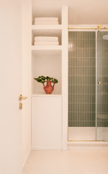 Bathroom in Pau with custom storage and walk-in shower