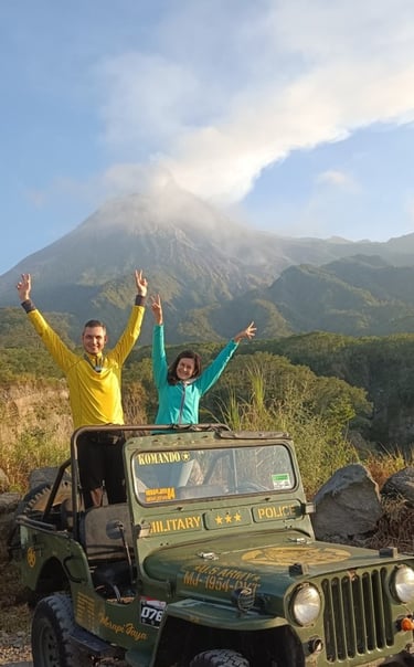 standing on a dirt road with a jeep