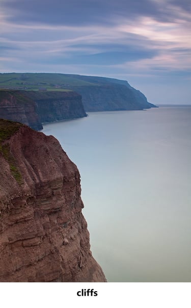 a cliff face with a cliff in the background fine art photograph
