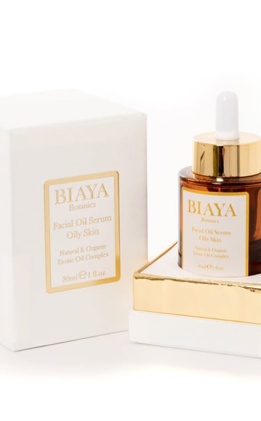 Biaya Botanics Facial Oil Serum Oily Skin in a gold and ivory box with an amber dropper bottle