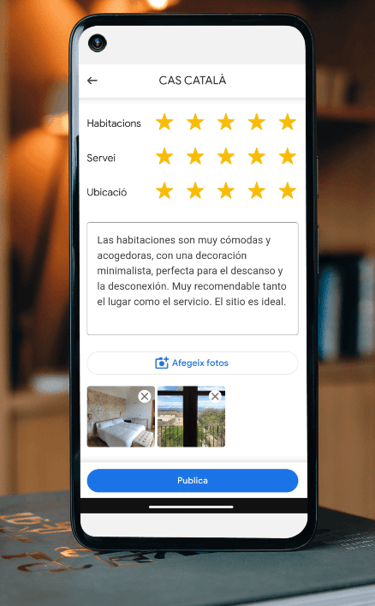 a smartphone phone showing a review of a hotel room