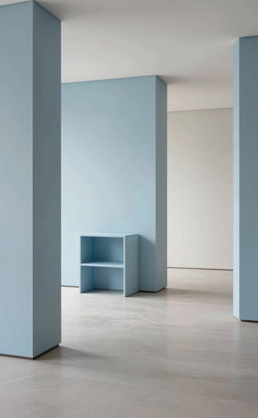 Professional photography of a minimalist interior featuring custom-designed furniture in a pale blue and soft white palette. Clean lines, sophisticated materials, and a spacious Baltic atmosphere. High-end architectural style.