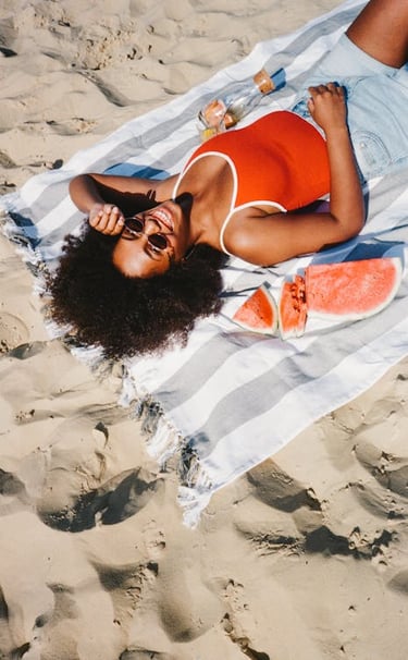 femme vacances bronzer vitamine D musculation Bien-être