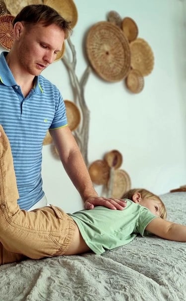 a man is doing a massage in a room