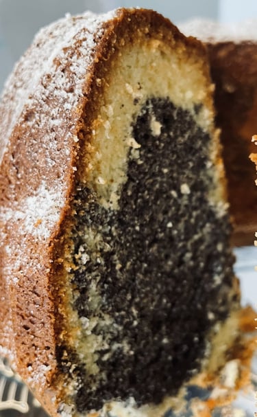 a marble cake with a slice taken out of it