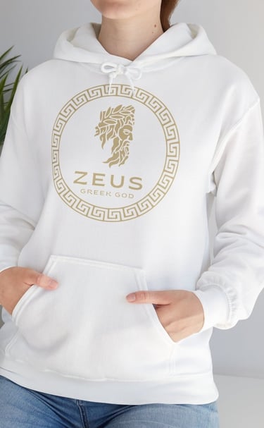 a woman wearing a white hoodie with a gold logo on it