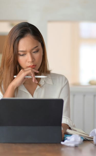 A young professional woman focused on a p[roject.
