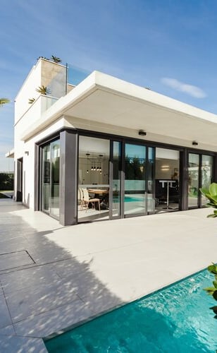 a modern house with a pool and a swimming pool