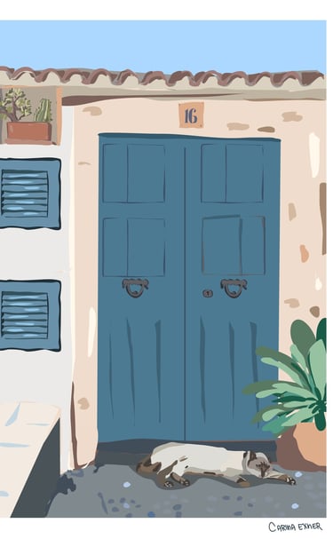 a cat laying on the ground in Banyalbufar Mallorca 