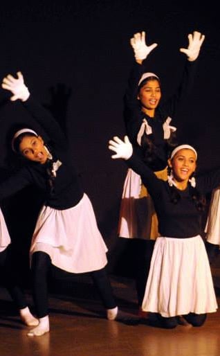 Group of mime artists performing a act using facial expressions and body movemen of kalpangan
