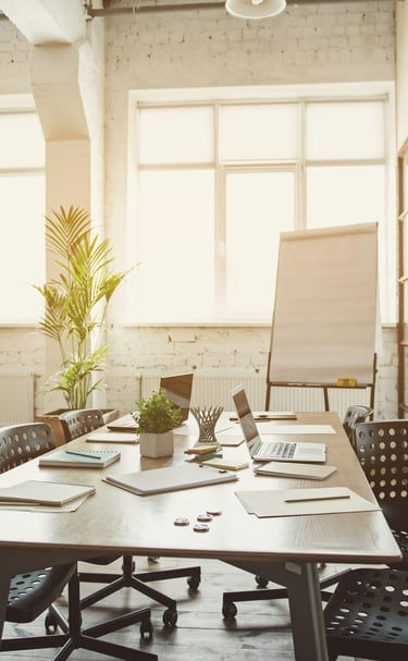 Empty meeting room with flip chart