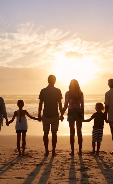 Family Sunset Beach Walk