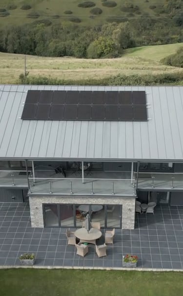 a house with solar panels on the roof