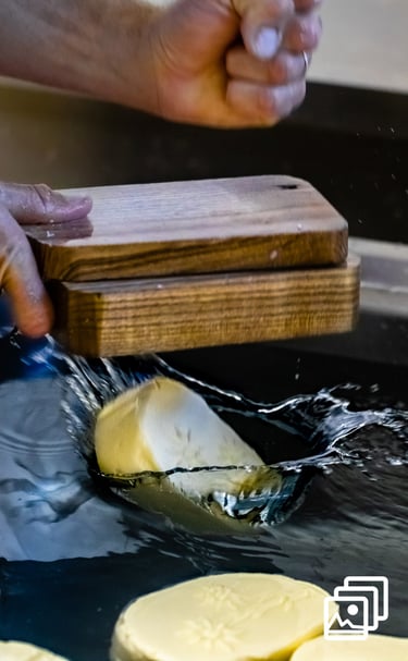 a person is making a butter