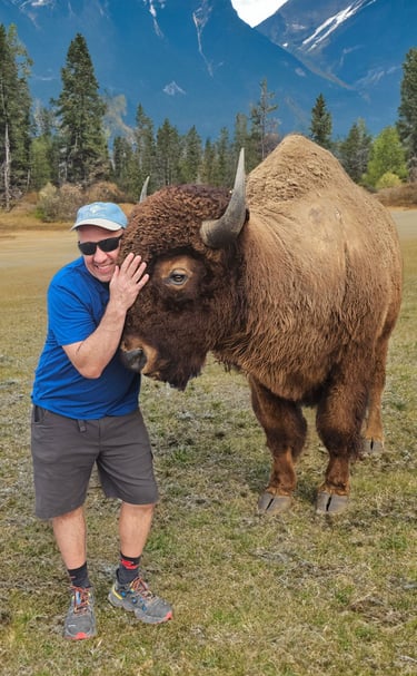 Jon hugging a bison - read the blog!