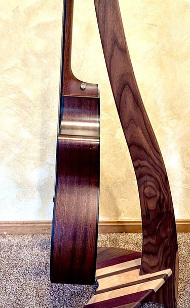 Handcrafted wood, mobile guitar stand crafted from Black Walnut, Maple, and Purple Heart. 