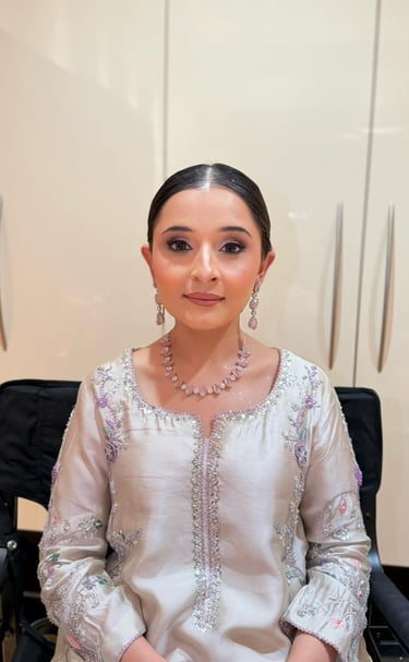 Elegant white bridal makeup look by Maria Padela Dubai