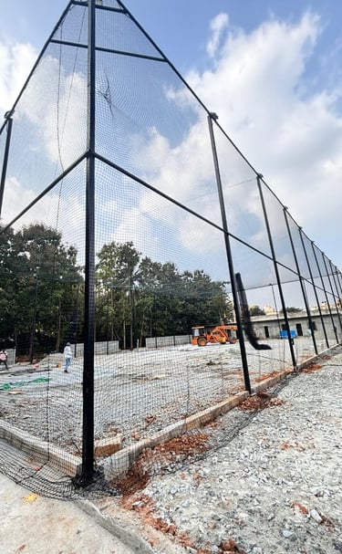 Close-up of a freshly installed cricket net at a local Chennai sports ground.