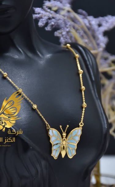 a woman's torso with a butterfly necklace | Alkanz Alasifar | Antalya Jewellery