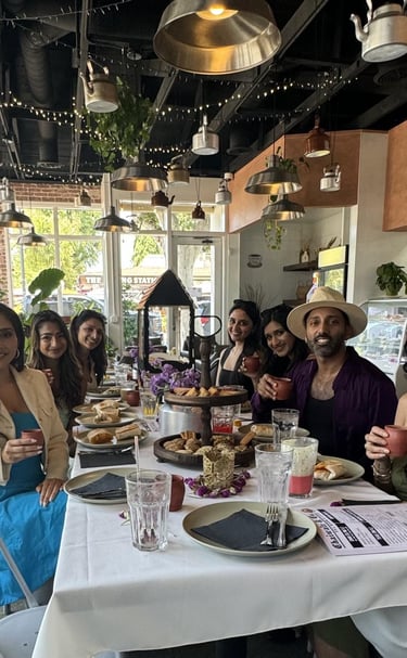 A group of desis enjoying Bollywood Afternoon Tea and Chai