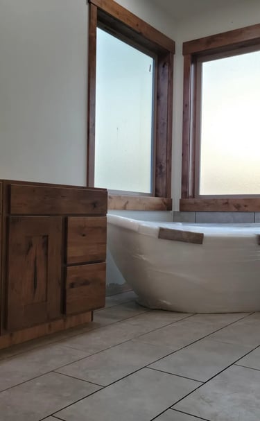 Custom bathroom with corner windows in this luxury home build