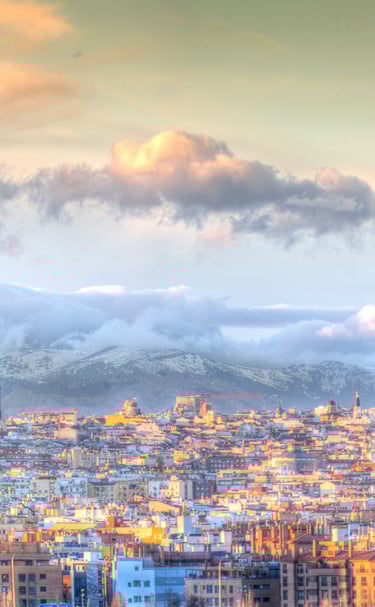 Madrid. a city skyline with a mountain in the background