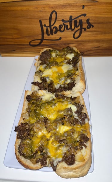 Philly steak and cheese with liberty sign