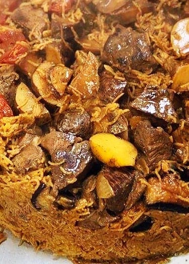 maqluba delicious seasoned rice with meat, potatoes, eggplant