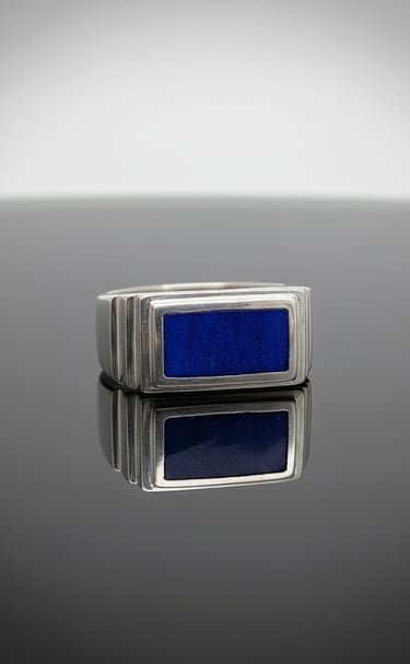 Custm cut lapis lazuli signet ring set in sterling silver. All work done by Kelly Allanson