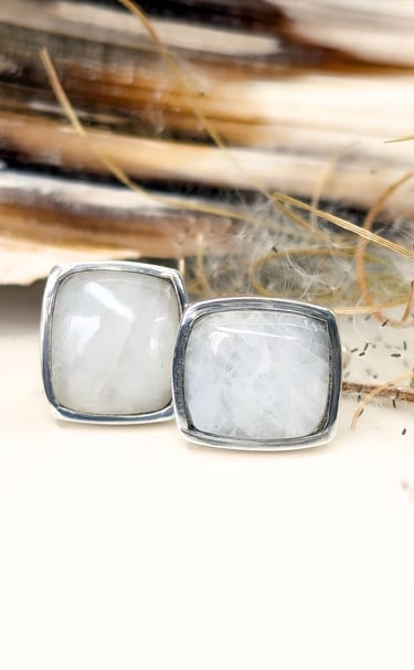 Custom Cut White Quartz Cabochons set in a pair of sterling silver hand fabricated cuff links
