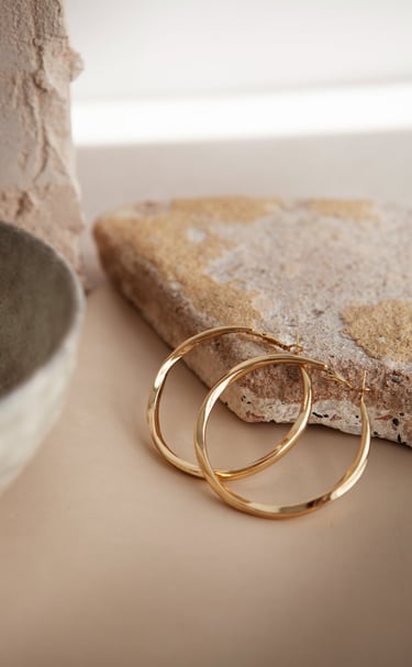 aury inc has a large section of hoop earrings