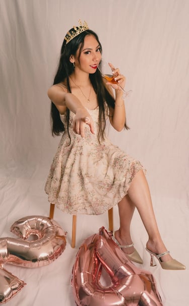 a woman in a tiablet and a crown crown