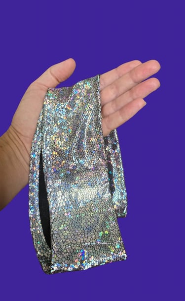 Hand hold a holographic sash ready for frequency healing
