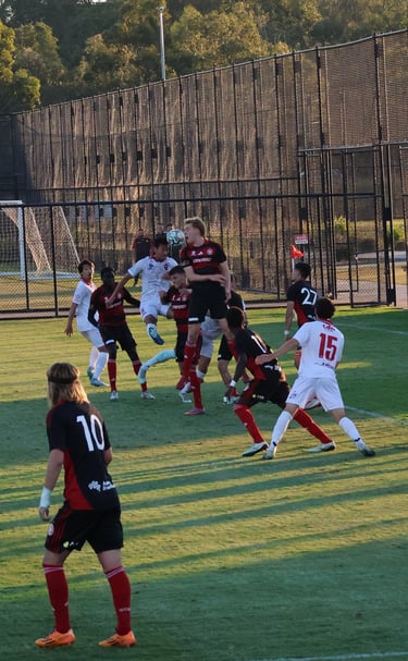 Banri challenges for a corner away to Western Sydney Wanderers