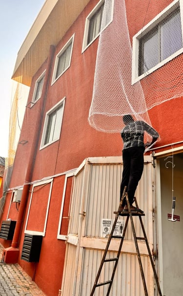 Pigeon net solution for balcony safety in mumbai installed by Arjilli Safety Nets.