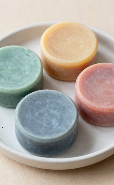 Massage soaps with smooth curves and creamy textures displayed alongside lavender sprigs.