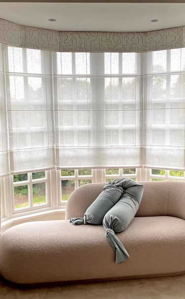 style and elegance roller and curtains in a pelmet