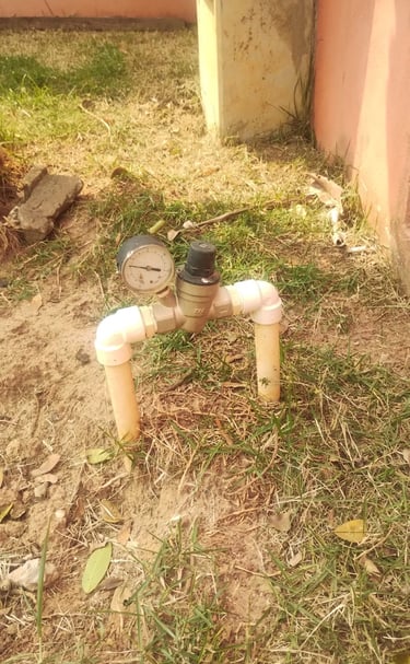 a water meter with a water meter on the ground