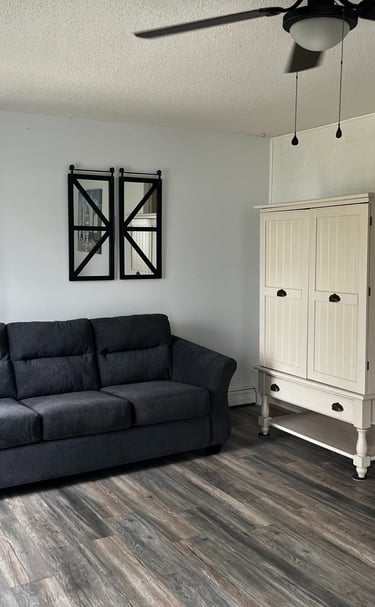 living room lakeside fireplace lake views southern michigan vrbo airbnb dock short term rental