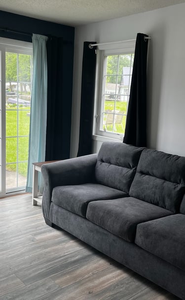 living room lakeside fireplace lake views southern michigan vrbo airbnb dock short term rental