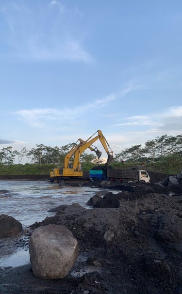 proses pengerukan pasir