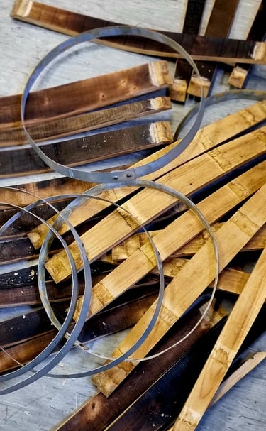 a bunch of wooden pieces of wood with a pair of scissors and a pair of