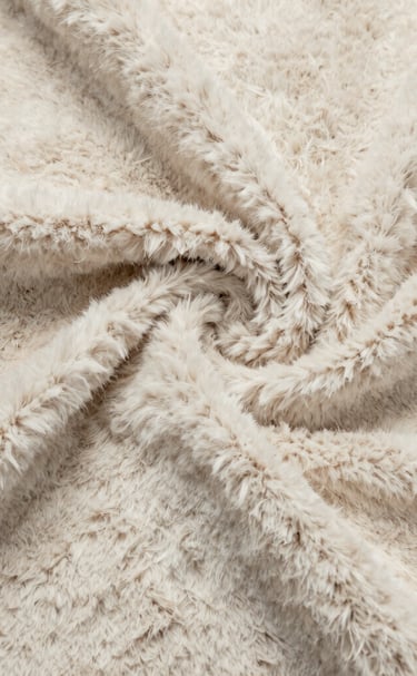 Fluffy recycled polyester fiber filling ready for plush toy stuffing.