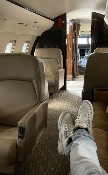 a person's feet on a plane
