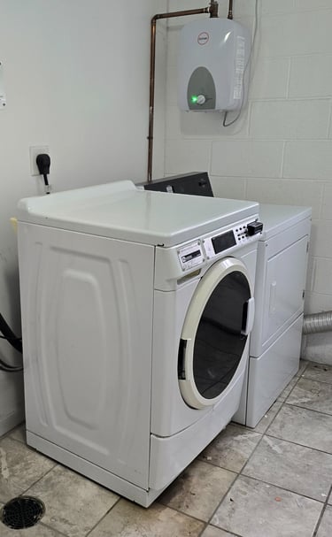 New card operated washers and dryers in every building.