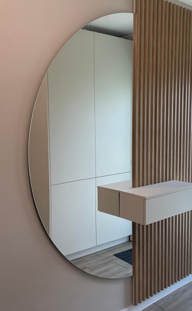 a mirror with a mirror in the middle of it