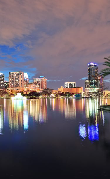 Orlando Florida skyline with lake and palm trees